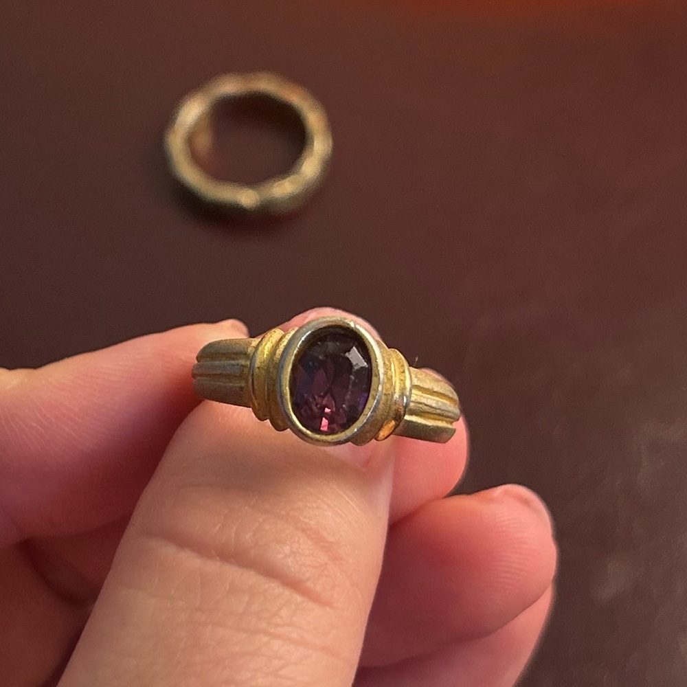 Elegant Gold Ring with Purple Gemstone